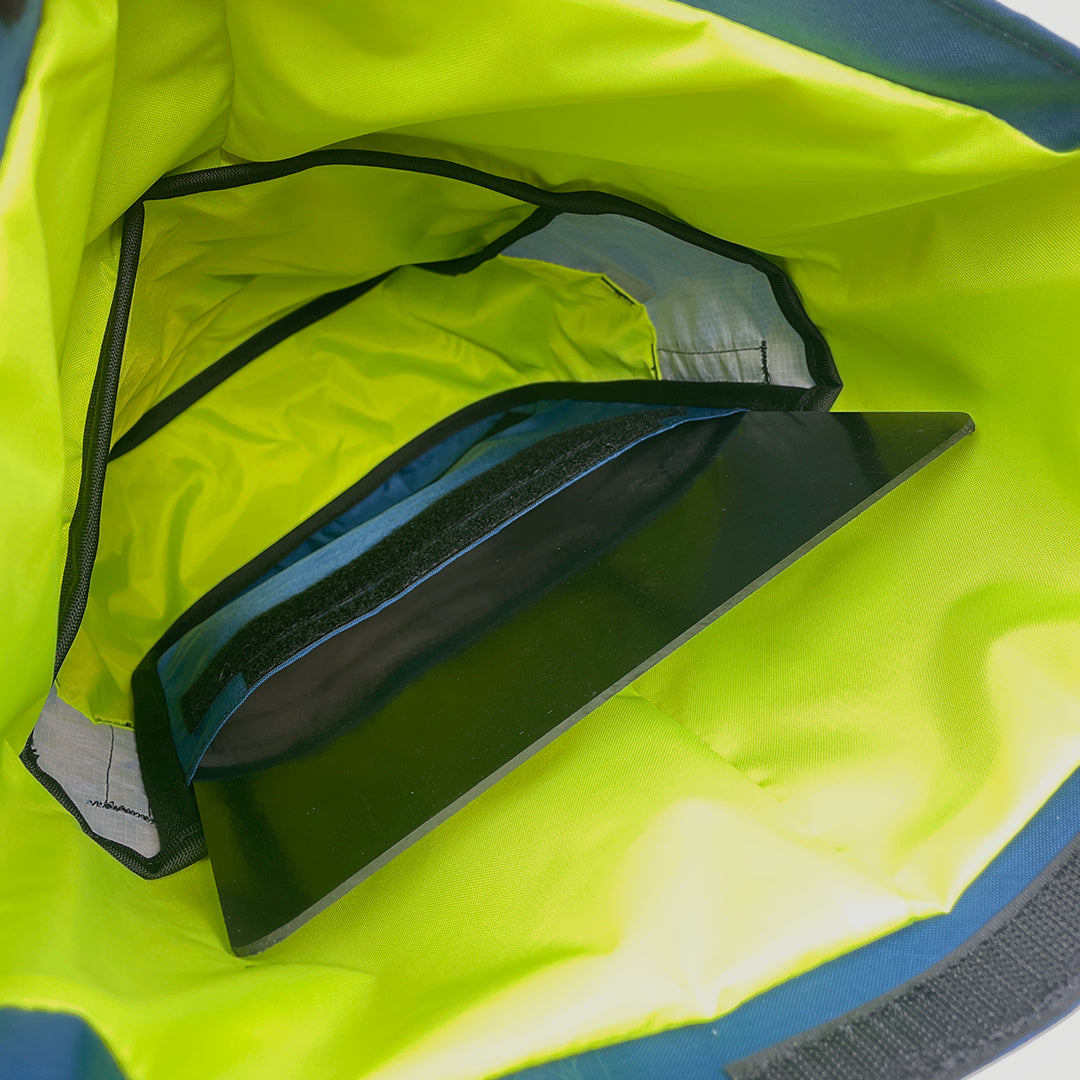 Interior view of bikepacking pannier showing backplate sleeve. - North St. Bags