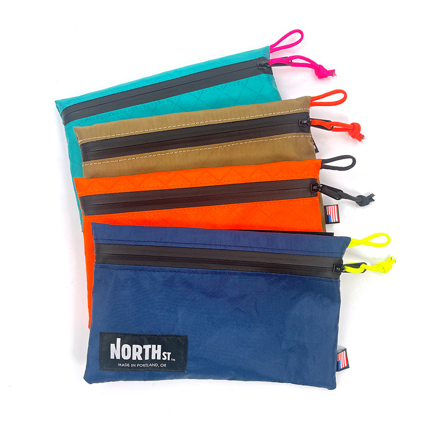 Array of wide size Shortstack Pouch Add-Ons.  North St Bags all-groups