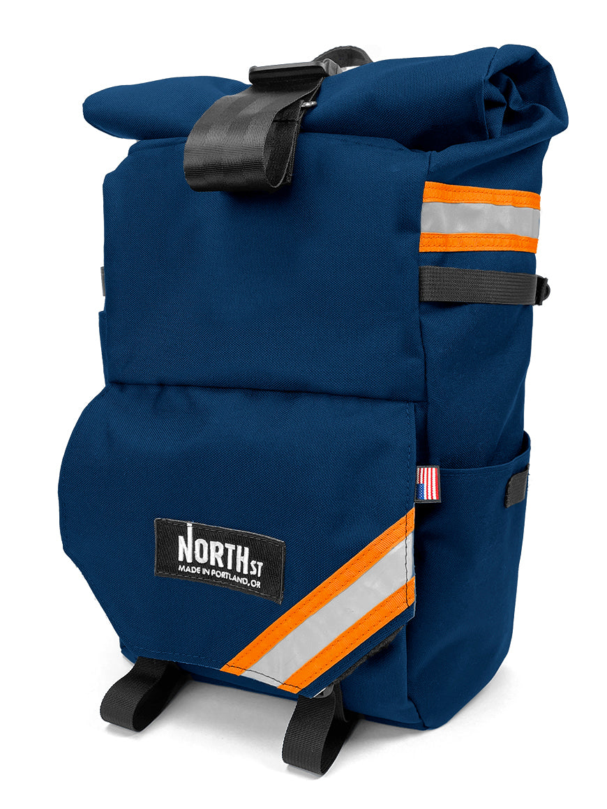 front view of woodward backpack pannier in midnight blue and orange - North St Bags