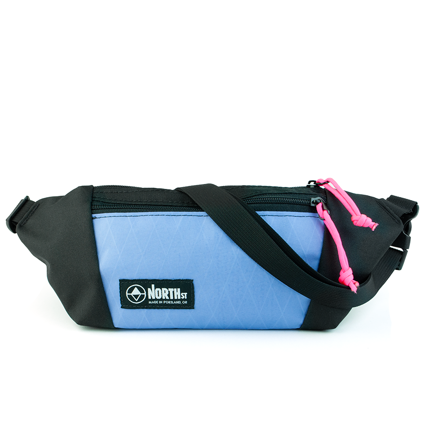 front view f pearl sling pouch in blue